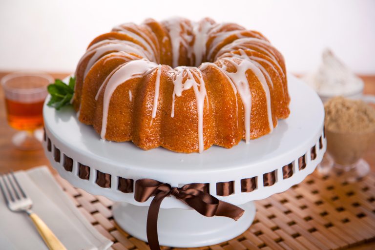 akery-style orange Bundt cake topped with citrus glaze and fresh orange zest